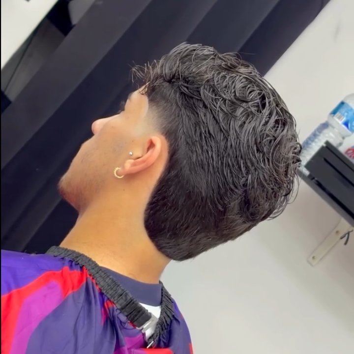 Corte degradado en Paradise Barber
